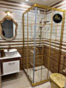 تصویر کابین دوش لوکس با شیشه ضد لک فریم طلایی 