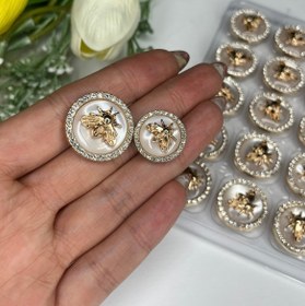 تصویر دکمه مجلسی طرح گوچی 