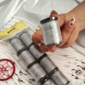تصویر نخ نامرئی نقره ای 