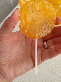 تصویر آب‌نبات چوبی 