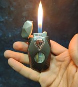 تصویر فندک دو حالته اتمی و شعله معمولی 