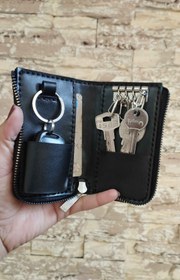 تصویر جاکلیدی دور زیپ با چرم طبیعی گاوی وکیوم چرم سحر کد121 Round zipper keychain with natural cow leather and Sahar leather code 121