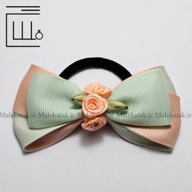 تصویر کش مو پاپیون گل دار 