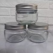 تصویر ظرف شیشه ای استوانه ارتفاع کوتاه با درب فلزی 