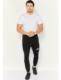 تصویر شلوار تمرینی تنگ مردانه، مشکی برند skechers Men Tight Fit Pull-On Training Tight, Black