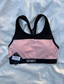 تصویر نیم تنه ورزشی زنانه مدل پشت بندی 