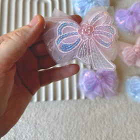 تصویر گیره سر پاپیونی 