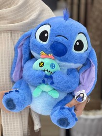 تصویر عروسک استیچ لیلو بدست 