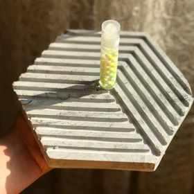 تصویر بالم لب توپی غلطکی 