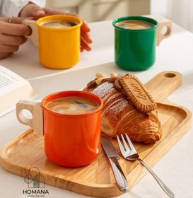 تصویر لیوان فلزی رنگی با دسته چوبی 