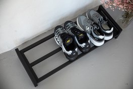 تصویر جا کفشی فلزی آتریوم – طراحی مینیمال و مقاوم برای نظم خانه 