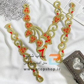 تصویر ست پنل با گلدوزی طلایی نارنجی 
