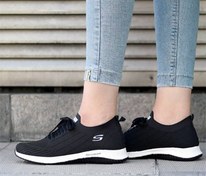 تصویر کفش اسپورت اسکیچرز پیاده‌روی مشکی و طوسی 