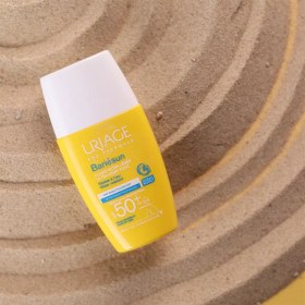 تصویر ضد آفتاب فلوئیدی اوریاژ URIAGE مدل باریسان BARIESUN حاوی +SPF50 حجم 30 میل | بدون رنگ، جوانساز 