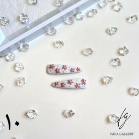 تصویر گیره تق تقی گلدوزی شده 