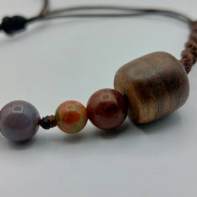 تصویر دستبند استوانه چوبی 