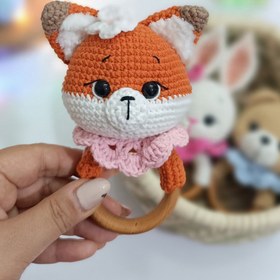 تصویر جغجغه روباه با حلقه چوبی راش Fox rattle