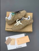 تصویر کتانی زنانه نیو بالانس ۵۳۰ میو میو با رویه جیر قهوه ای 