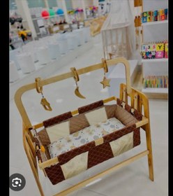 تصویر گهواره چوبی ایسان گهواره چوبی ایسان