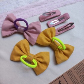 تصویر پاپیون کش مو گل دوزی 