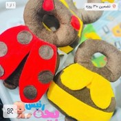 تصویر محافظ سر نوزاد طرح زنبور 