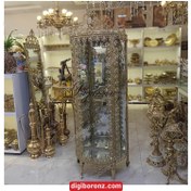 تصویر بوفه برنجی برنزی طرح آفتاب سنگين Bronze brass sideboard with heavy sun design