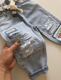 تصویر شلوار جین زاپ دار بچگانه از یک الی ۷ سال - ۷۰ / ۱۹۷۹ 
