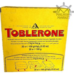 تصویر شکلات تابلرون زرد همراه با عسل و نوقای بادام باکس ۲۰ عددی toblerone 