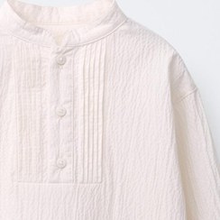 تصویر پیراهن آستین‌بلند یقه هکی دکمه‌دار از برند زارا 