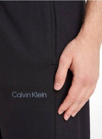 تصویر شلوار راحتی مردانه کلوین کلین - شلوار بافت - پوشاک ورزشی - پنبه‌ای، مشکی برند Calvin Klein Calvin Klein Men's Sweatpants - Knit Pants - Sportswear - Cotton , Black