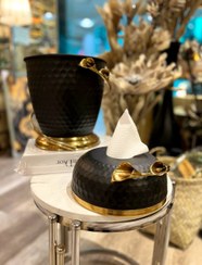 تصویر سطل و جا دستمالی گلدار مشکی 