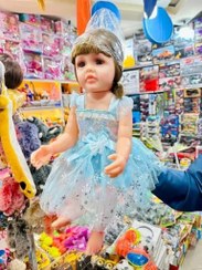 تصویر عروسک سیلیکونی بزرگ با موهای طبیعی و مژه مصنوعی 