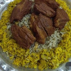 تصویر باقالی پلو با گوشت گوسفندی جذاب بامخلفات و سیب زمینی سرخ شده با برنج ایرانی 