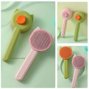 تصویر برس سگ و گربه گوش دار با دکمه تخلیه 