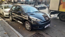 تصویر پژو 207 مدل 1402 ا دنده ای سقف شیشه ای دنده ای سقف شیشه ای