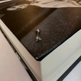 تصویر پرسینگ گوش مثلث سایز 2 