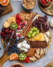 تصویر تخته سرو پیتزا بامبو مدل راکتی 