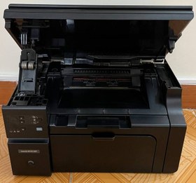 تصویر پرینتر لیزری اچ پی 1132 (استوک) ا HP M1132 Multifuntion Laser Printer HP M1132 Multifuntion Laser Printer