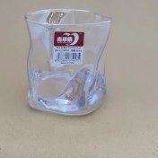 تصویر لیوان شیشه ای دفرمه طرح هفت رنگ 