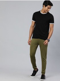 تصویر شلوار جین کشباف مردانه با فیت باریک و طراحی رنگی در سبز زیتونی برند the indian garage co Olive Green Men Slim Fit Casual Colourblocked Regular Knitted Jogger