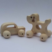 تصویر ماشین اسباب بازی چوبی کودک مدل خودرو و سگ 