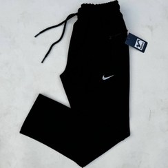 تصویر شلوار ورزشی نایک دمپا آزاد سورمه ای 