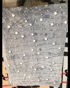 تصویر پتو شب نما یک نفره طرح ستاره ریسه ای 