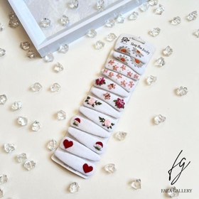 تصویر گیره تق تقی گلدوزی شده 