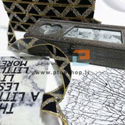 تصویر نوار خرج کار حرارتی و دوختی لمه کاری شده با مخمل مشکی و سنگ ریز براق منسجم 