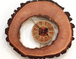 تصویر ساعت دیواری بزرگ چوب گردو طرح چشم قطر 60 سانت Large Wooden Wall Clock