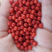 تصویر مهره سنگ مرجان سایز 4سوراخ دار سنگ اصل طببعی درجه یک معدنی 