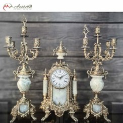 تصویر ست ساعت رومیزی و شمعدان با بدنه ی برنزی به رنگ فورتیک و طراحی بسیار شیک مناسب دکوراسیون کد 473 