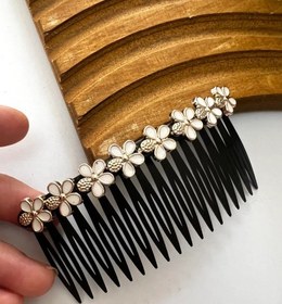 تصویر شانه مو پلاستیکی 