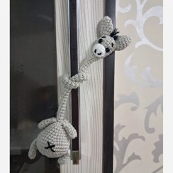 تصویر عروسک بافتنی الاغ گردن دراز 